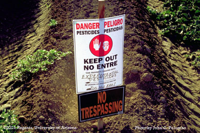 Common field posting following the application of a restricted use pesticide in Arizona.