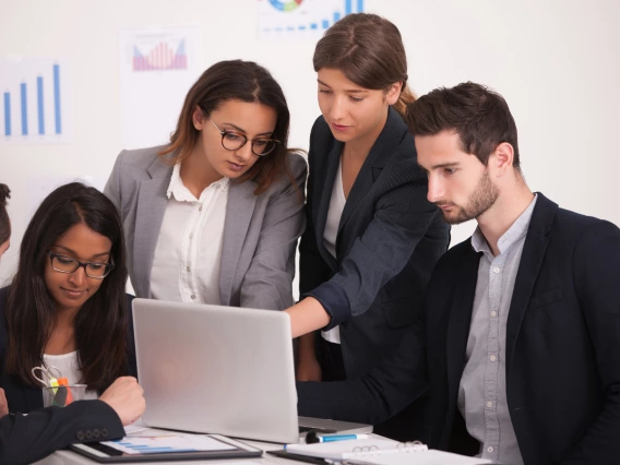 Personal and Family Financial Planning students work together on a project for classes