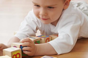 Kid playing with blocks