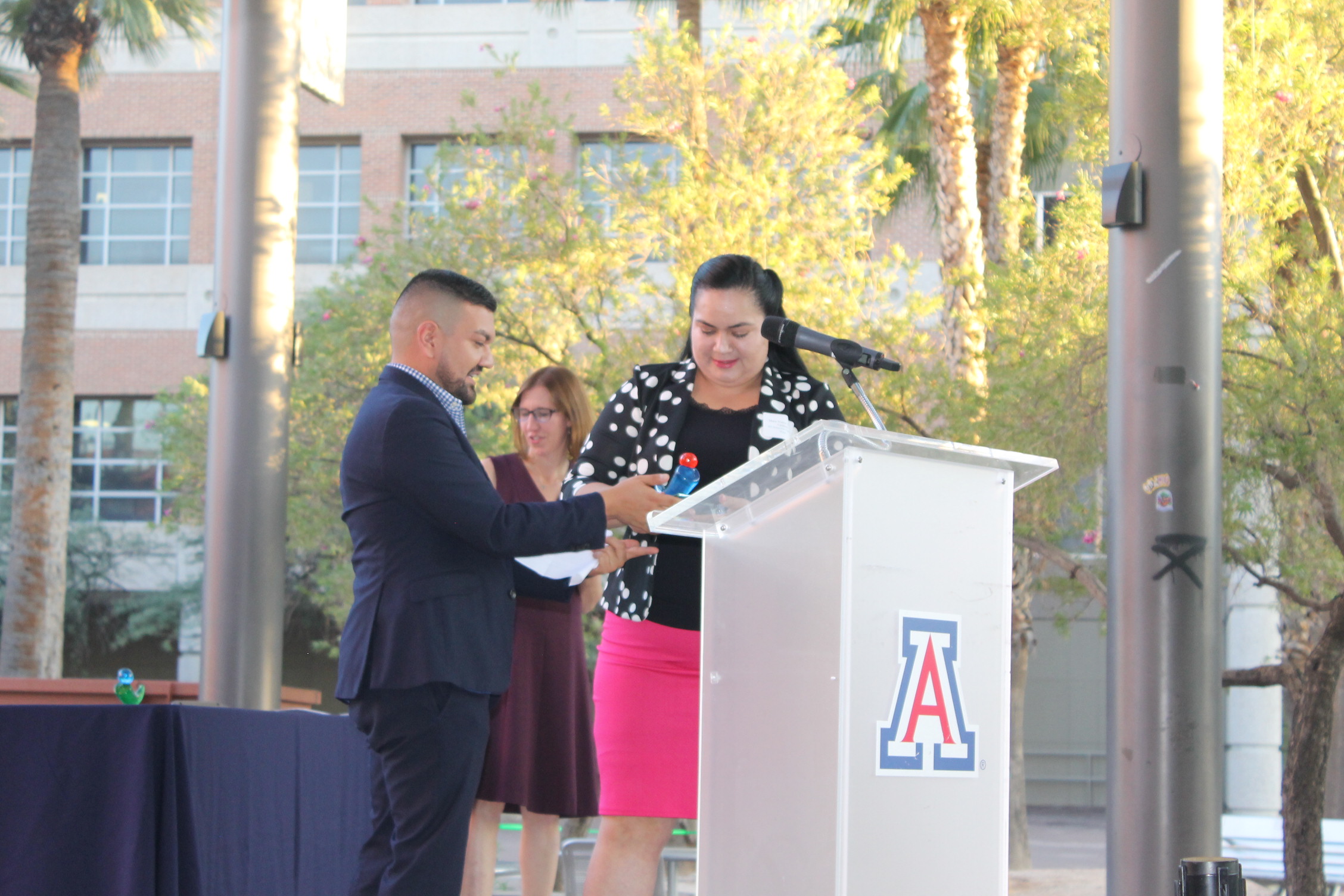 Andrés Cano presents the Richard Elías Legacy Award to Maria Vianey Valdez-Cardenas