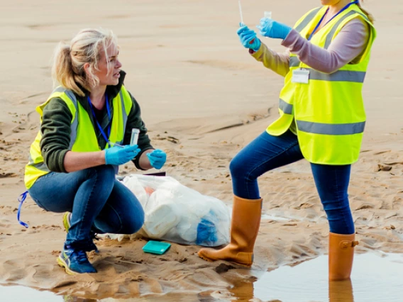 students taking water samples