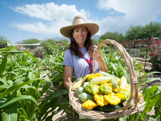 Woman with basket of vegetables