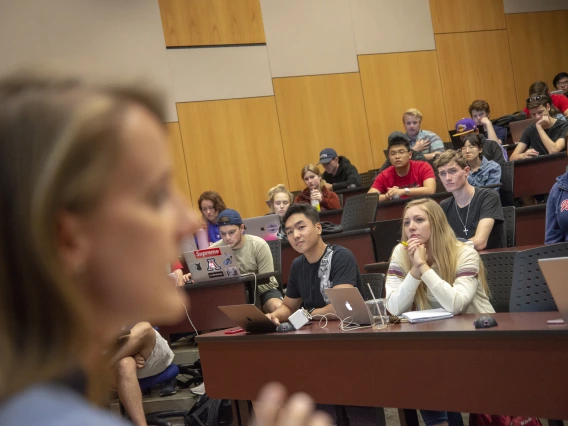 Students learning in an agricultural resource economics lecture in CALES