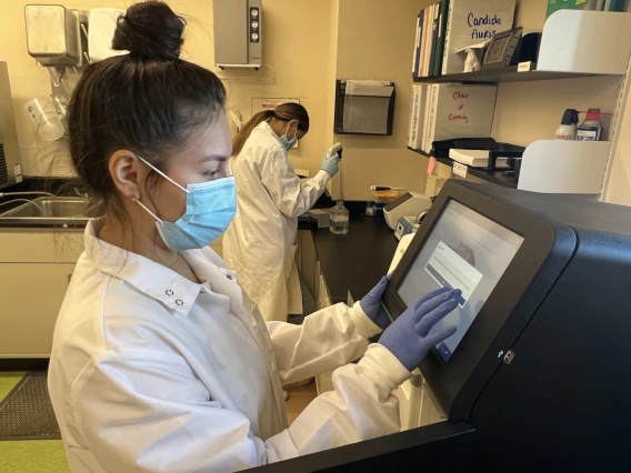 Research assistants working in the Yuma Agricultural Center's WBE lab