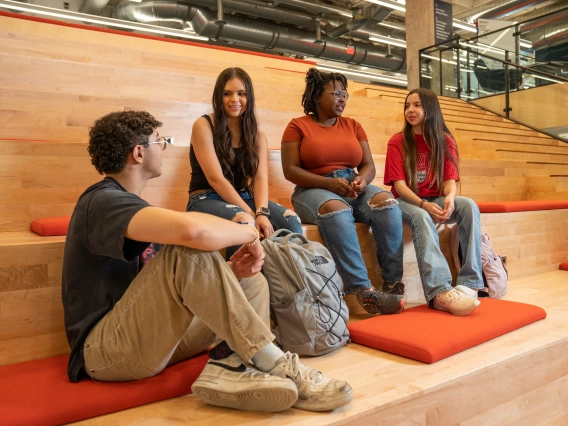 Students sitting in a library.