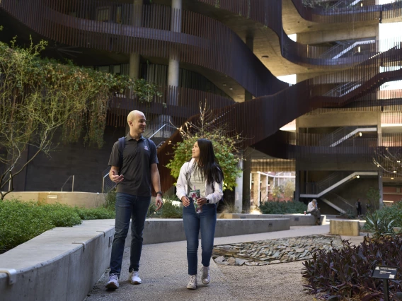 Students walking and talking.