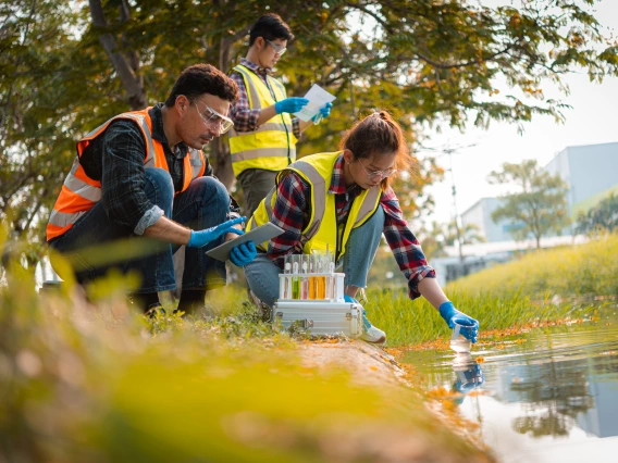 Environmental science students collecting water samples.