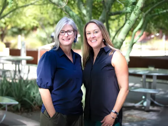 Research collaborators and '23- '24 Research Leadership Institute (RLI) graduates Helena Morrison (left) and Ashley Snider (right).