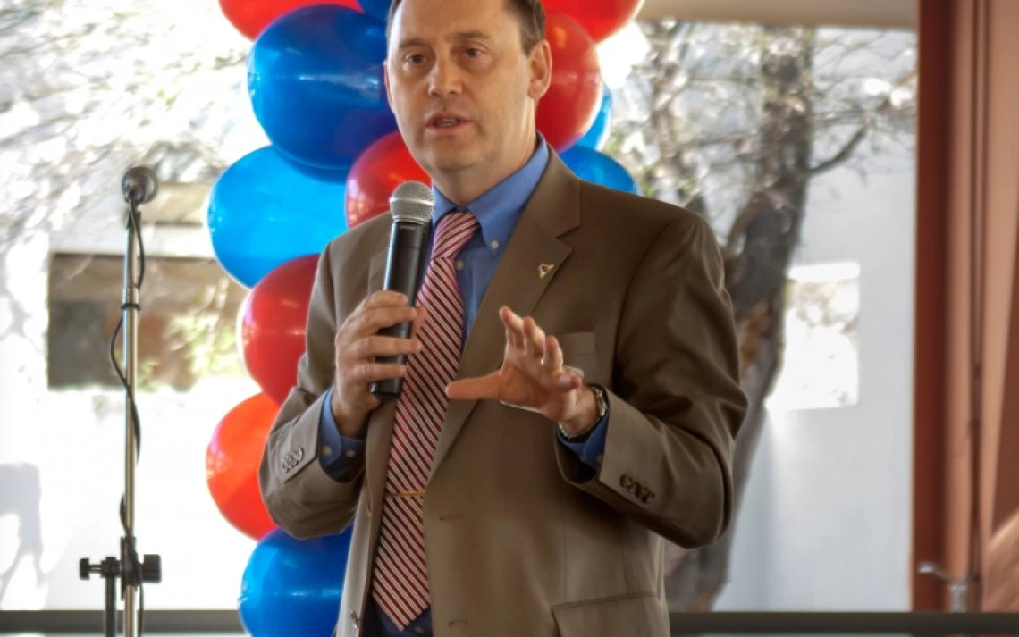 Dr. Burgess welcomes guests to the 2013 dedication festivities