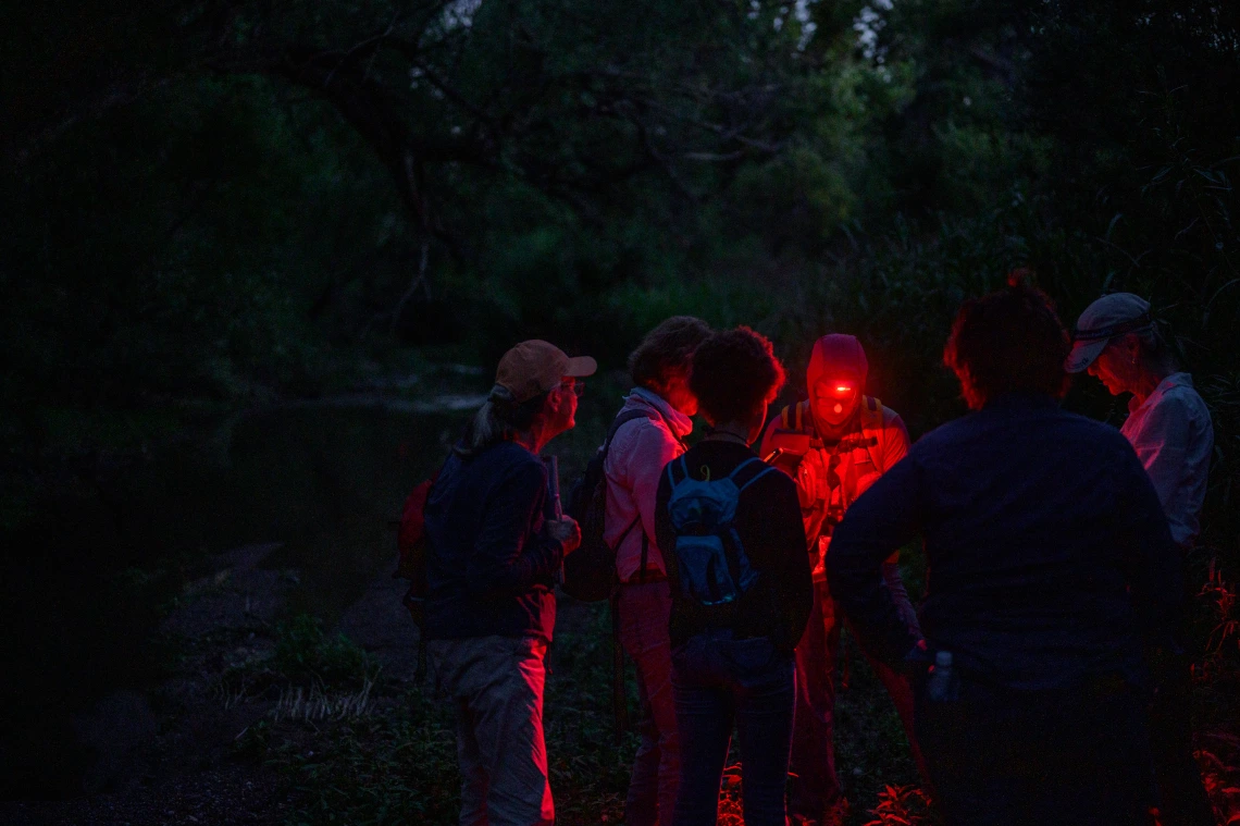 Rachel Laura and volunteers prepare for a night of surveying fireflies