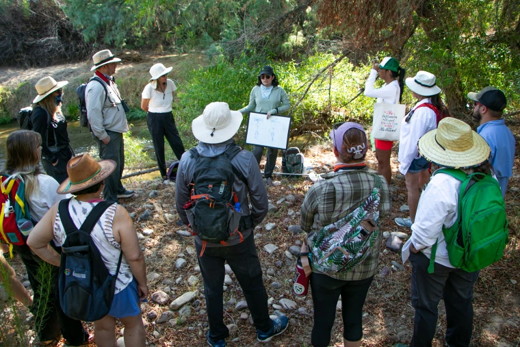 Rocio Guzman in the field, teaching educators about dragonflies.