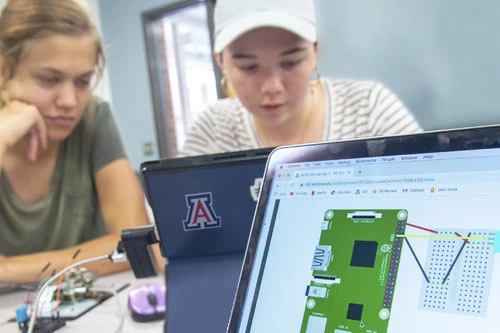 students working at a computer