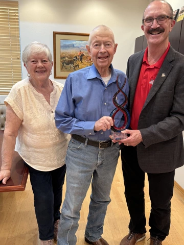 Mary Beth and Andy Groseta with Ed Martin, Director of the U of A Cooperative Extenstion. Andy was awarded the 2025 Extensionist of the Year award on May 9, 2025. 