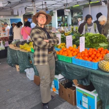 Leon at a market in Australia