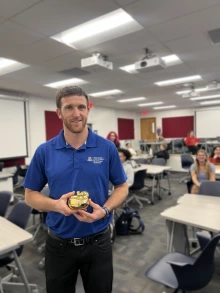 Harris receiving the Golden Apple Award