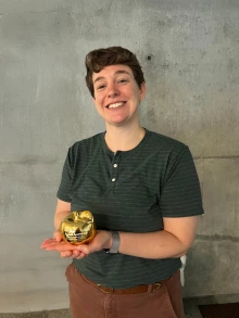 Bledsoe receiving the Golden Apple Award